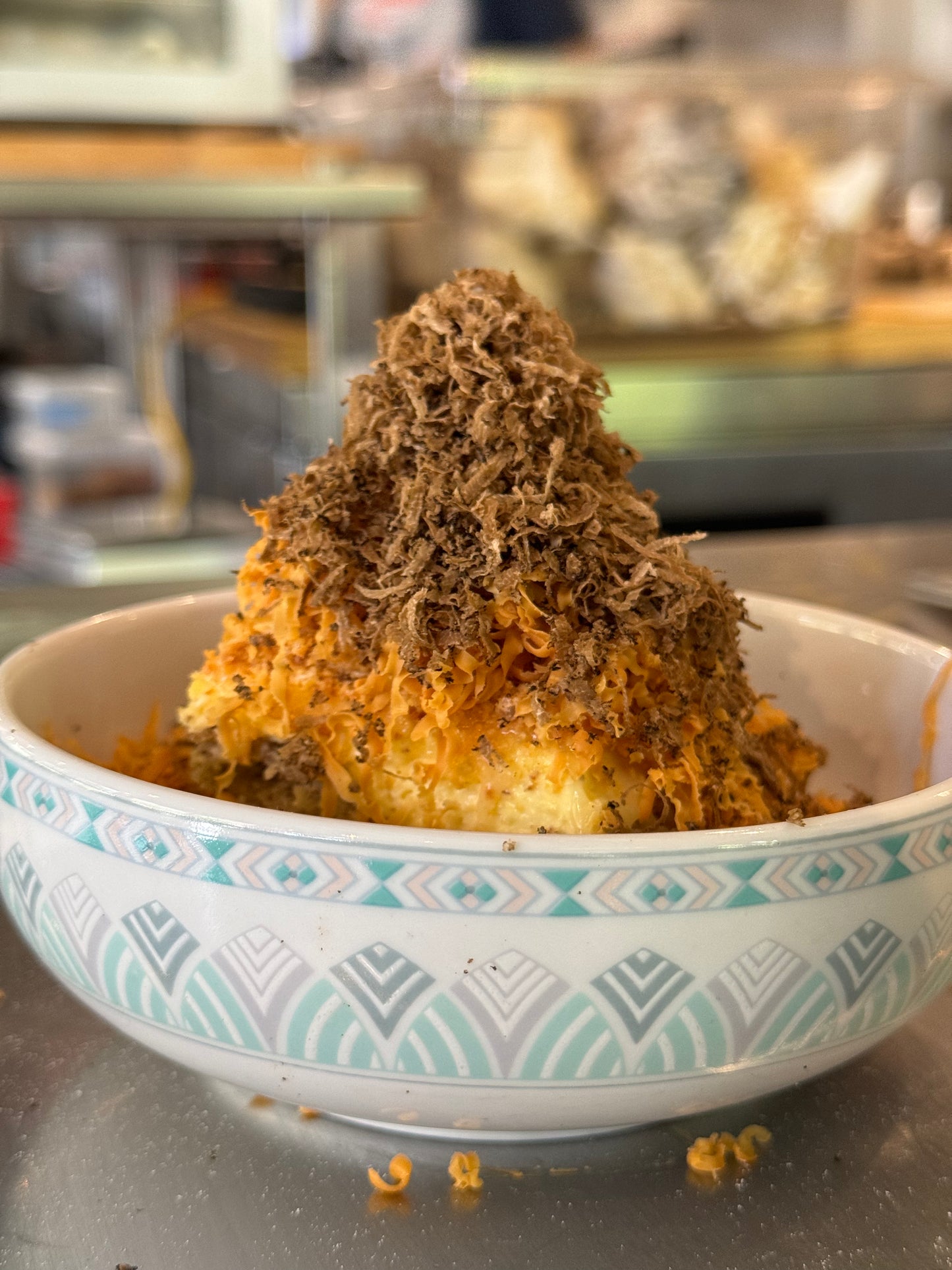 A whole Italian Black Burgundy Truffle with its dark, warty exterior