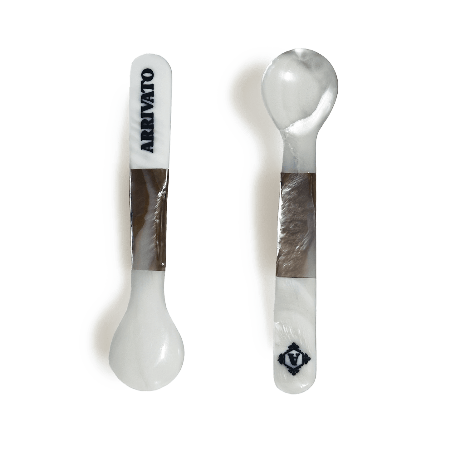 An Arrivato 2-Tone Mother of Pearl Spoon resting on a tin of caviar